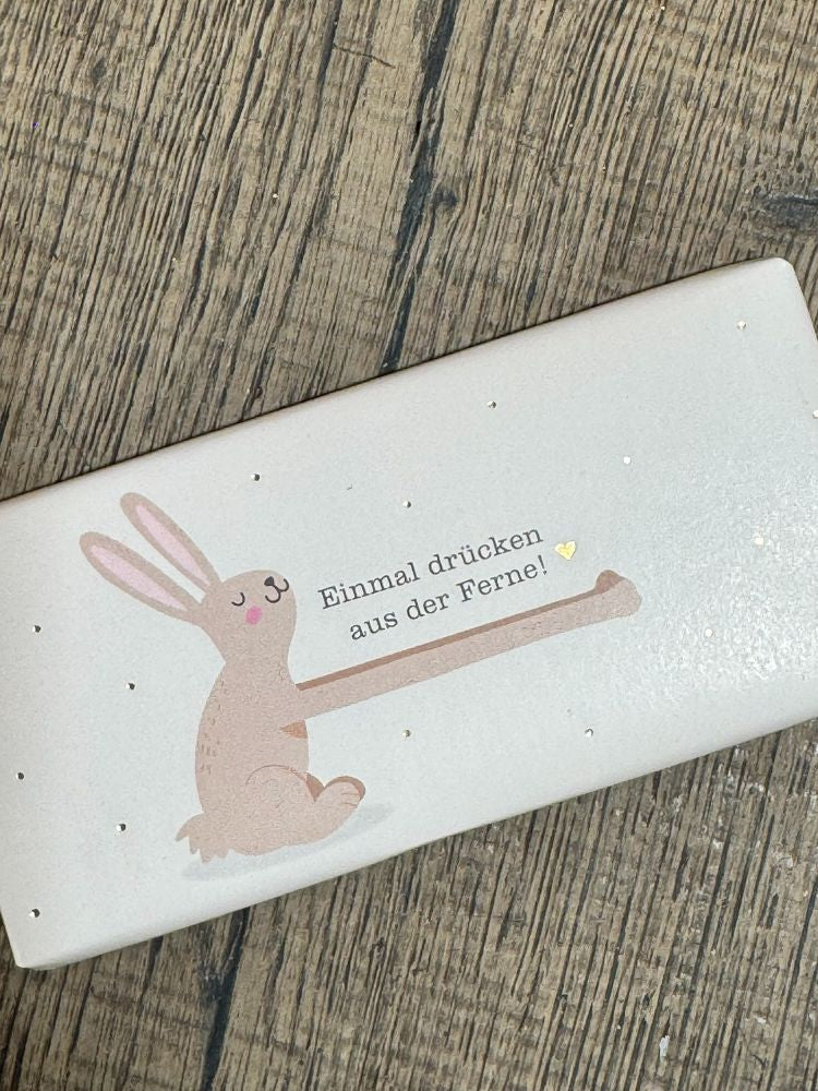 Ausgepackte Frühlings Geschenkbox mit Sonnentor Frühlingskuss Kräutertee Bio 27g 2x Tartufo schwarz