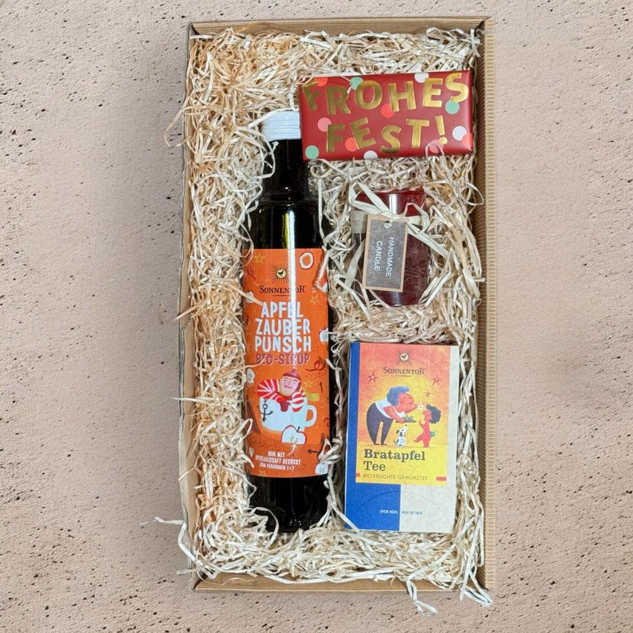 Apfel Punsch Geschenkset mit Sonnentor Apfelzauber Punsch Sirup Bratapfel Tee Schokolade und bordeaux Kerze in Geschenkverpackung